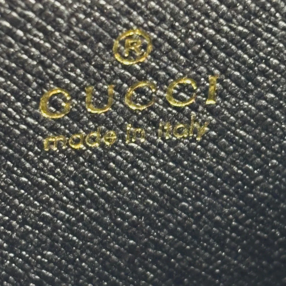 Gucci Zip Around Wallet Unisex OS Black GG Embossed Leather